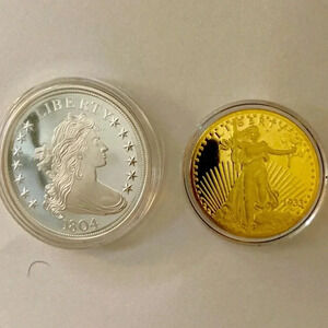 American mint gold and silver plated commemorative coin duo